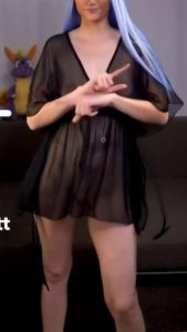 Cute girl with colored hairstyle dancing while wearing a see through nightdress on NSFW TikTok