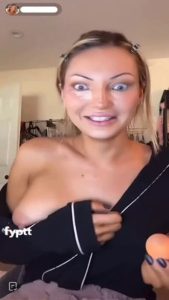 Girl shows nip slip on live TikTok and pretends nothing happened