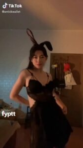 Bunny Asian girl stripping naked off her black nightgown on TikTok as shes dancing to the music