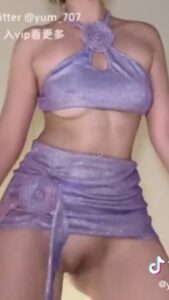 Cute Asian girl in sexy dancing outfit hides her tits but leaves her pussy exposed on TikTok