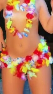 Hawaiian TikTok thot dancing while wearing only a lei and being topless